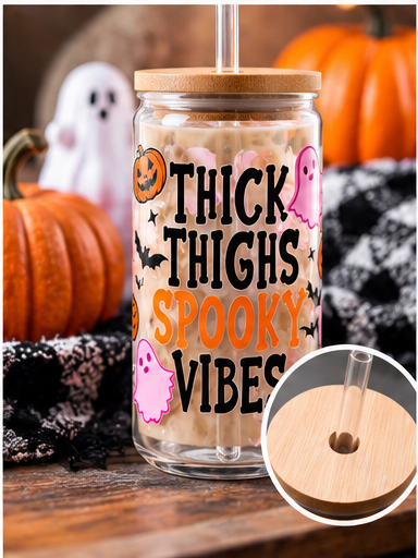 Thick Thighs Spooky Vibes 16 oz glass tumbler with Halloween ghost design and bamboo lid