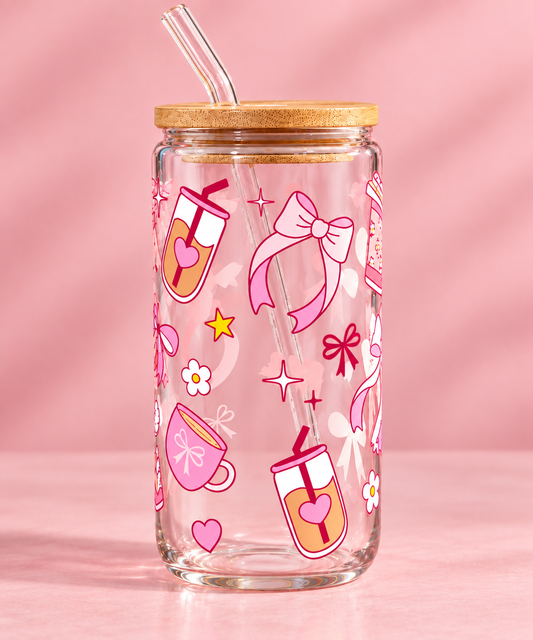 16 oz pink bow glass tumbler. Featuring an adorable bow-inspired design, this cup is perfect for anyone who loves all things pink, girly, and coquette.