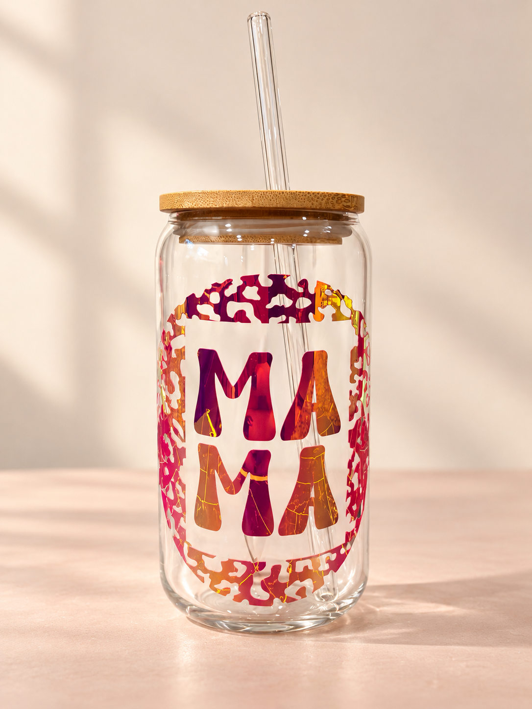 Personalized 16oz MAMA glass tumbler with pink, orange, and purple holographic leopard-print design and natural bamboo lid.