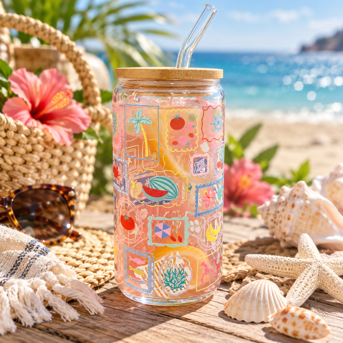 Coastal 16 oz glass tumbler with colorful beach-inspired design and bamboo lid